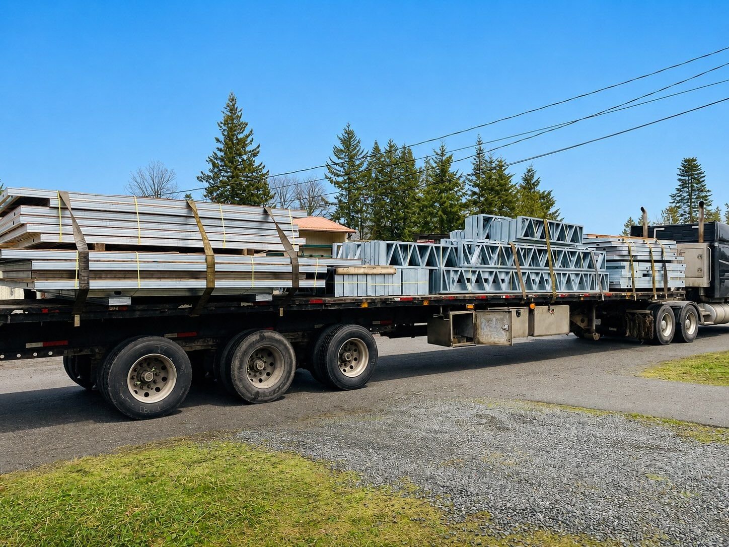 Light-gauge steel wall panels loaded on a truck for delivery